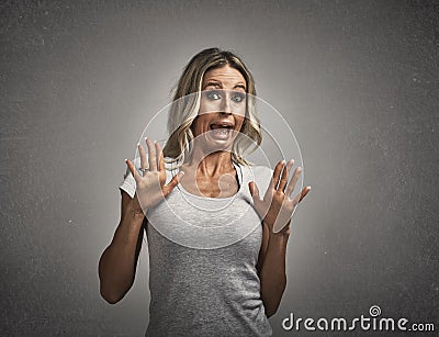Scared afraid young woman fear. Stock Photo