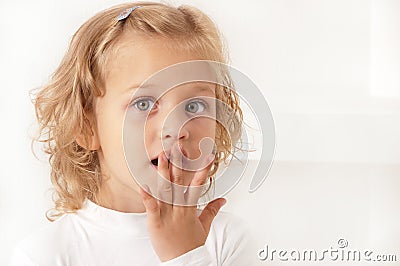 Scared amazed little girl on white background Stock Photo