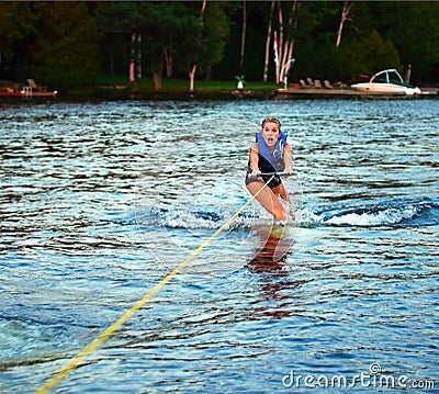 Scared Girl Wakeboarding Stock Photo