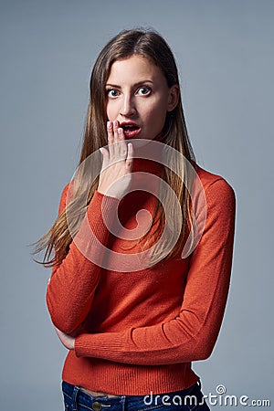 Scared impressed woman with mouth opened Stock Photo