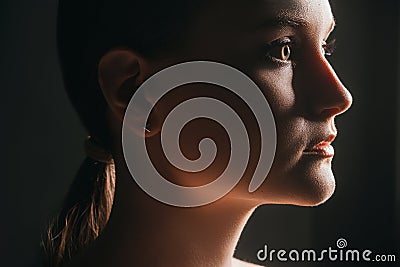 Scared woman face domestic violence insecure dark Stock Photo