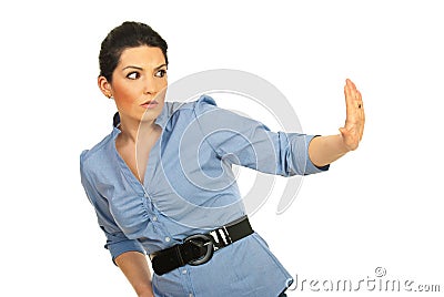 Scared woman with stop hand to a side Stock Photo