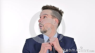 Scared Young Businessman Feeling Afraid, White Background Stock Photo