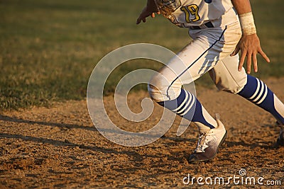 Scarmbling Back to First Base Stock Photo