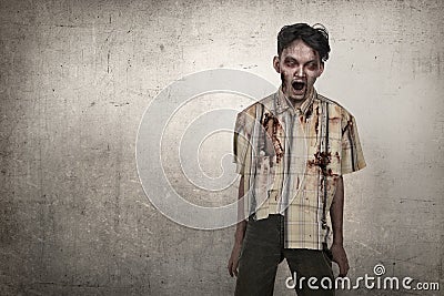 Scary asian zombie man in a clothes standing Stock Photo