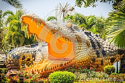 Scary Chalawan crocodile statue at Bueng Si Fai, the public park with lake at Muang district, Pichit province, Thailand. Chalawan Editorial Stock Photo