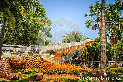 Scary Chalawan crocodile statue at Bueng Si Fai, the public park with lake at Muang district, Pichit province, Thailand. Chalawan Editorial Stock Photo