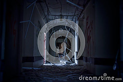 Scary dark horror hallway in an abandoned decaying hosptial in europe Stock Photo