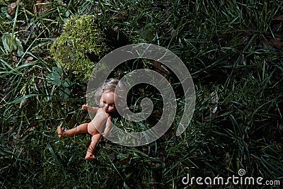 Scary doll. Child abuse. Crime scene Stock Photo