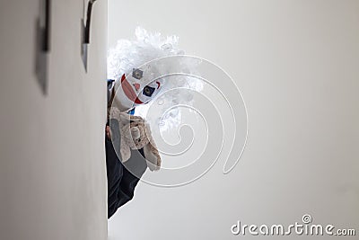 Scary evil clown boy Stock Photo