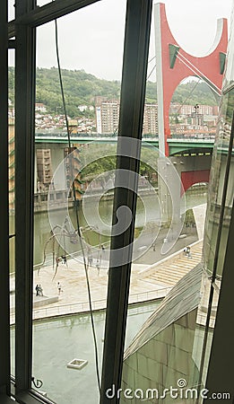 A scary giant spider, seen from the window of the Guggenheim Museum in Bilbao Editorial Stock Photo