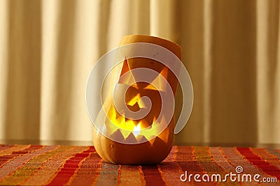 Scary hallowen face carved in a pumpkin Stock Photo