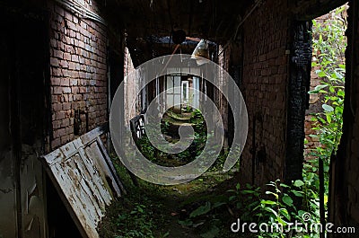 SCARY HALLWAY IN ABANDONED HOTEL Stock Photo