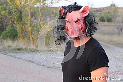 Scary human pig with long hair Stock Photo