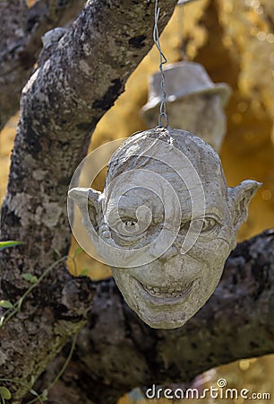 Scary Stone - rock sculptures of giant heads carved into the sandstone cliff Stock Photo