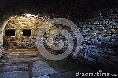 Scary underground, old castle cellar Stock Photo