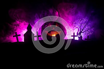 Scary view of zombies at cemetery dead tree, moon, church and spooky cloudy sky with fog, Horror Halloween concept with glowing pu Stock Photo