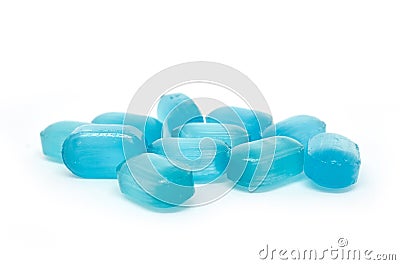 Scattered blue lollipops isolated on white background Stock Photo