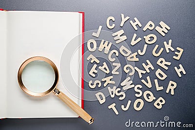 Alphabets spread out from the book Stock Photo