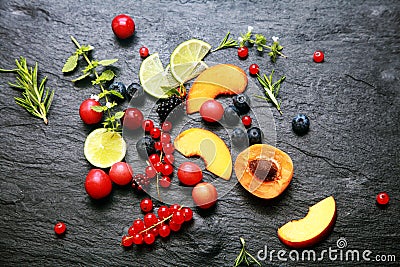 Scattered fresh fruit and berries Stock Photo