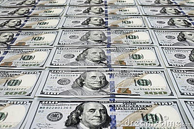 Scattered one hundred dollas banknotes close up background Stock Photo