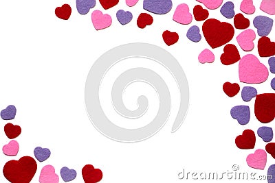 Scattered red, purple and pink felt hearts isolated on a white background, corner, border - valentines, love Stock Photo