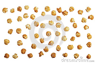 Scattered sweet caramel popcorn isolated on white Stock Photo