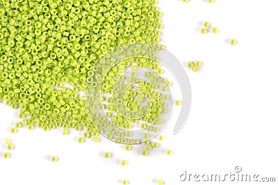 A scattering of blue beads on a white background Stock Photo