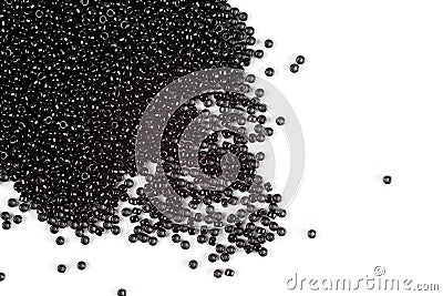 Scattering of colored beads on a white background Stock Photo