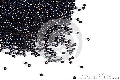 Scattering of colored beads on a white background Stock Photo