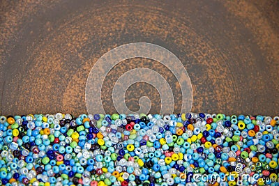 Scattering of many small, multi-colored beaded beads Stock Photo