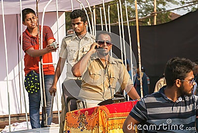 Scene with actors in policemen uniform playing corruption police department at traditional Goa carnival Editorial Stock Photo