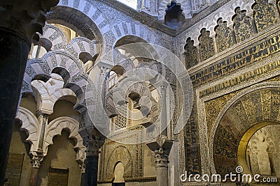 Arches and islamic carved decoration and arches in the Mosqueâ€“Cathedral of Cordoba Stock Photo