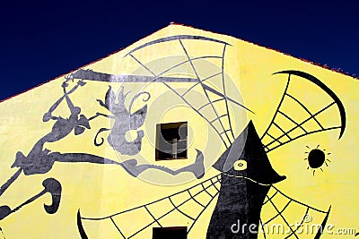 Scene from the book Don Quixote de la Mancha represented on the facade of a building Stock Photo