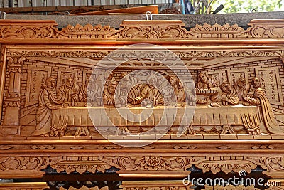 Scene of the last dinner carved in wood. Pattern of Supper carved on wood. Jesus shared with Apostles in Jerusalem before Stock Photo