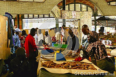 Scene life in the village market, authentic place and behaviour. Vibrant colors Editorial Stock Photo