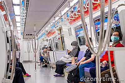 The scene people are sitting inside the MRT train. Taipei, Taiwan Editorial Stock Photo