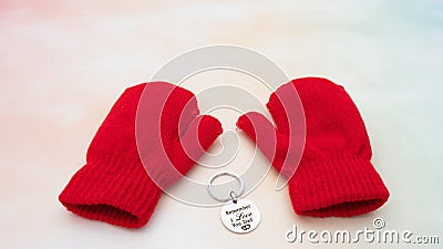Scene of red gloves near love keychain gift for father in father`s day with colorful background Stock Photo