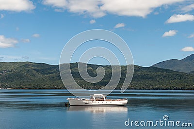 Scene tranquility of a boat on a lake Stock Photo