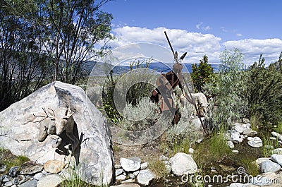 Stag Sculpture and sculpture of fisher and his dog. Editorial Stock Photo