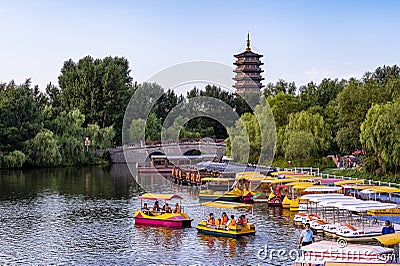 The scenery of the North Lake National Wetland Park in Changchun, China with lotus in full bloom Editorial Stock Photo