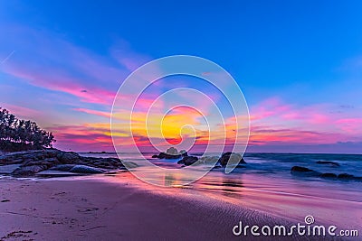 scenery sunset on the rock at Pilay Natai beach Stock Photo