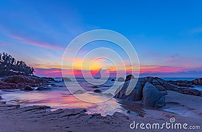 scenery sunset on the rock at Pilay Natai beach Stock Photo