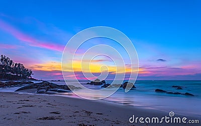 scenery sunset on the rock at Pilay Natai beach Stock Photo