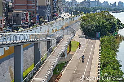 Scenery of Tamsui river bank, view on Taipei bridge, a bridge link New Taipei City to Taipei city Editorial Stock Photo