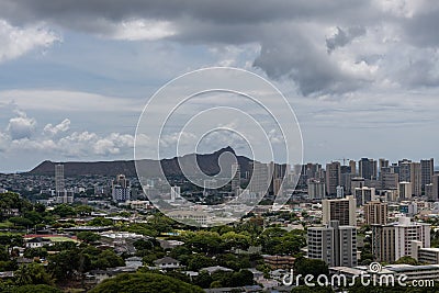 Scenic aerial Honolulu vista with the Diamond Head in the background on a rainy day, Oahu Stock Photo