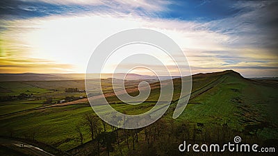 Scenic aerial landscape photo at Sycamore Gap in Northumberland Stock Photo