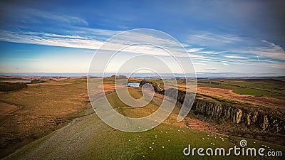 Scenic aerial landscape photo at Sycamore Gap in Northumberland Stock Photo