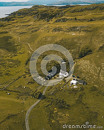 Scenic aerial shot of a farmhouse with beautiful natural surroundings in the Glencoe Stock Photo