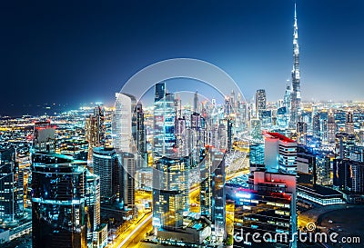 Scenic aerial skyline. Big modern city at night. Business bay, Dubai Stock Photo